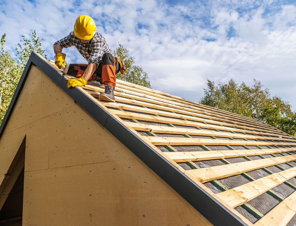 construction-worker-builds-a-home-roof-in-daytime-2026-03-24-04-47-45-utc